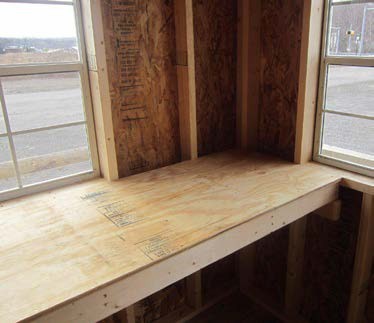 Wooden shelves inside a shed