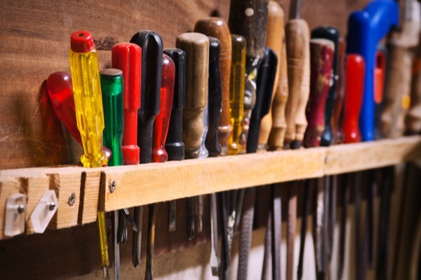 Screw drivers on shed wall on blog page.